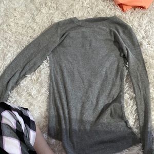 A gray long sleeve shirt,small, from bozzolo